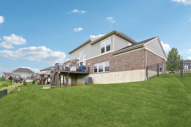 574 Ravensridge Ct, Alexandria, KY 41001 - rear view of house featuring a deck, stairs, brick siding, and central AC