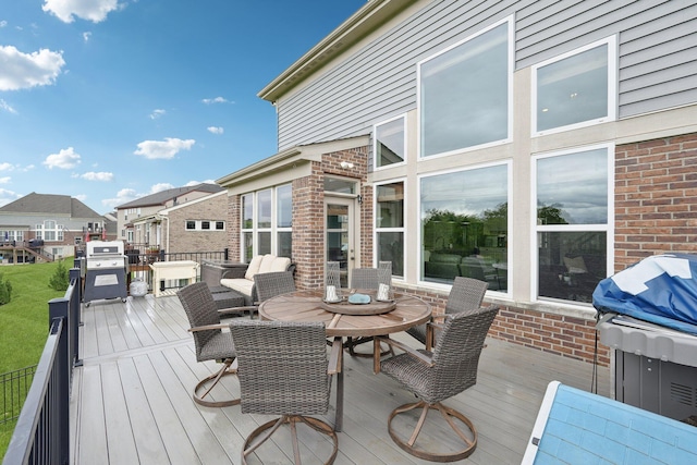 574 Ravensridge Ct, Alexandria, KY 41001 - wooden deck featuring outdoor dining space, a residential view, and grilling area