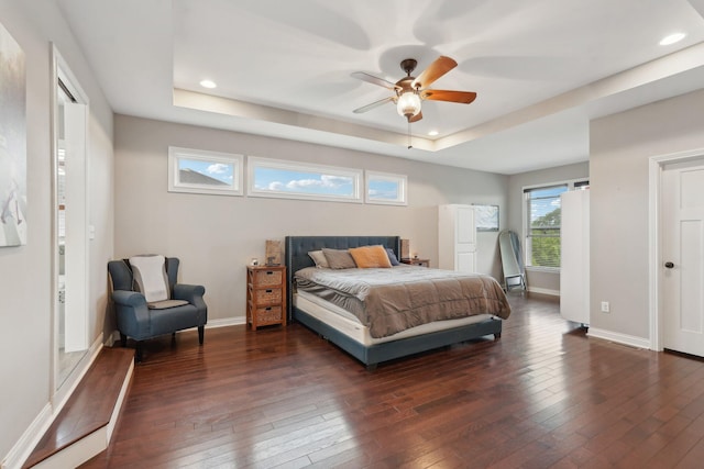 574 Ravensridge Ct, Alexandria, KY 41001 - bedroom with a raised ceiling, dark wood finished floors, recessed lighting, baseboards, and a ceiling fan