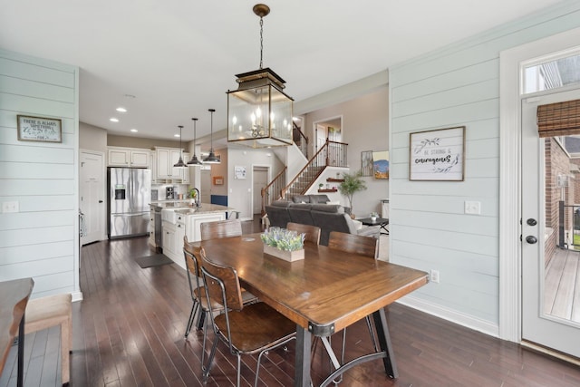 574 Ravensridge Ct, Alexandria, KY 41001 - dining area featuring stairs, dark wood finished floors, baseboards, recessed lighting, and a chandelier