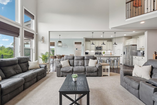 574 Ravensridge Ct, Alexandria, KY 41001 - living room with a high ceiling, carpet, and recessed lighting
