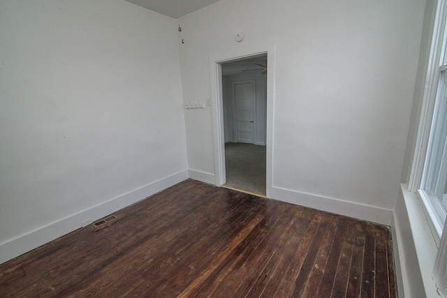 3213 Decoursey Ave, Covington, KY 41015 - unfurnished room featuring dark wood-style floors and baseboards