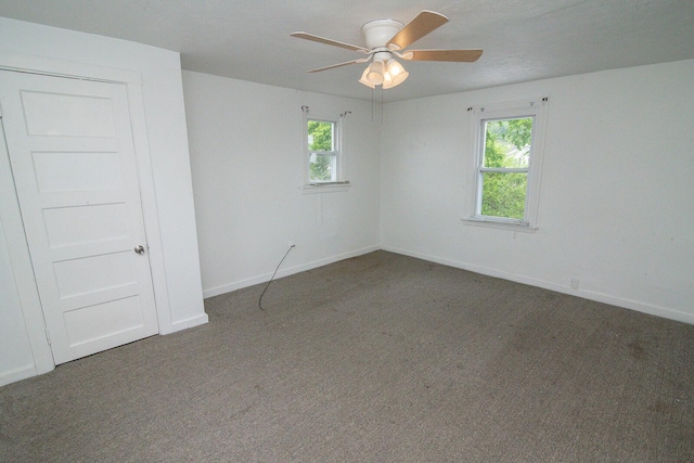 3213 Decoursey Ave, Covington, KY 41015 - carpeted empty room with ceiling fan, plenty of natural light, and baseboards