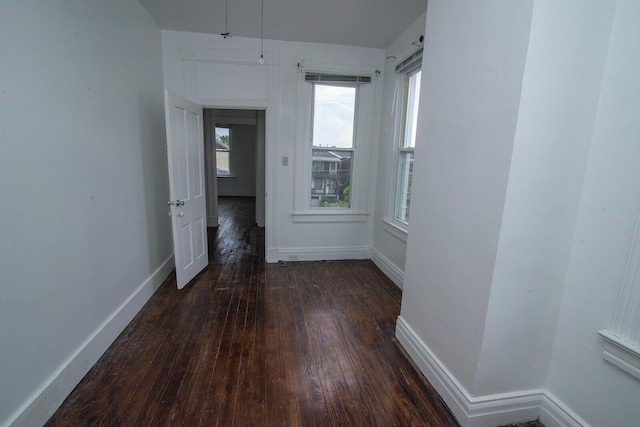 3213 Decoursey Ave, Covington, KY 41015 - empty room featuring dark wood-style floors and baseboards