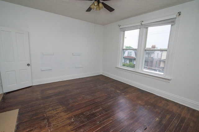 3213 Decoursey Ave, Covington, KY 41015 - unfurnished room with dark wood-style floors, ceiling fan, and baseboards