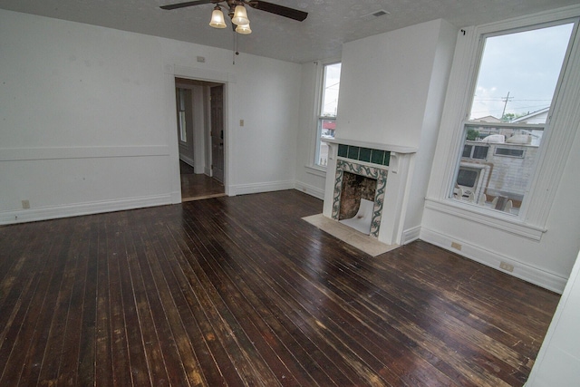 3213 Decoursey Ave, Covington, KY 41015 - unfurnished living room featuring hardwood / wood-style floors, a ceiling fan, a high end fireplace, and baseboards