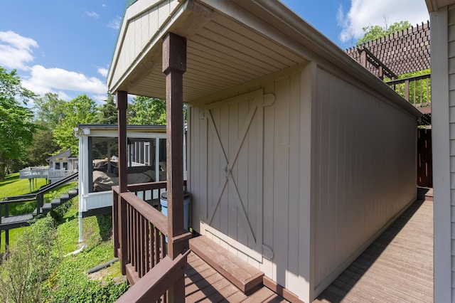 335 Fernwood Dr, Williamstown, KY 41097 - wooden terrace featuring a sunroom