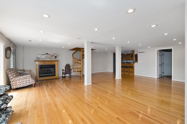 335 Fernwood Dr, Williamstown, KY 41097 - living area featuring stairway, a fireplace, light wood-style flooring, baseboards, and recessed lighting