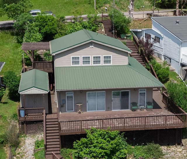 335 Fernwood Dr, Williamstown, KY 41097 - back of house with stairway, a wooden deck, and metal roof