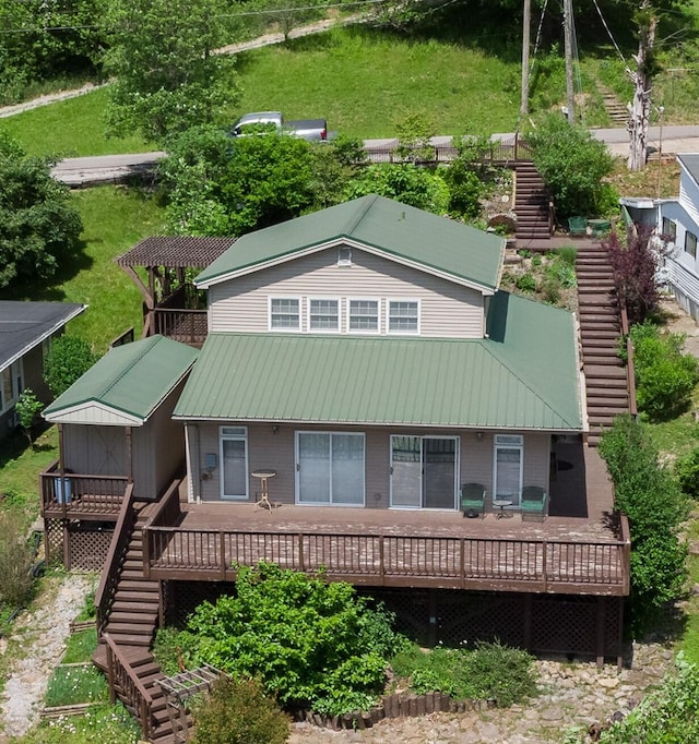 335 Fernwood Dr, Williamstown, KY 41097 - view of front of house with stairs, a deck, and metal roof