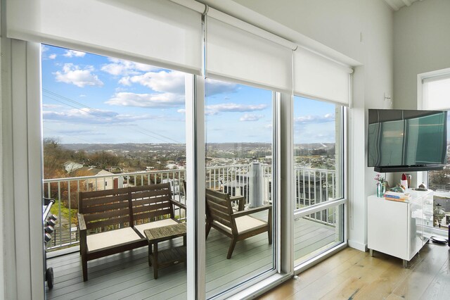 120 Main St Unit 306, Newport, KY 41071 - doorway to outside with hardwood / wood-style flooring