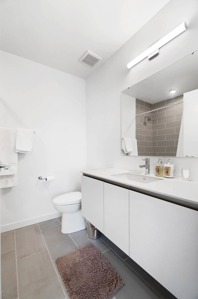 120 Main St Unit 306, Newport, KY 41071 - full bath with tiled shower, vanity, toilet, tile patterned floors, and baseboards