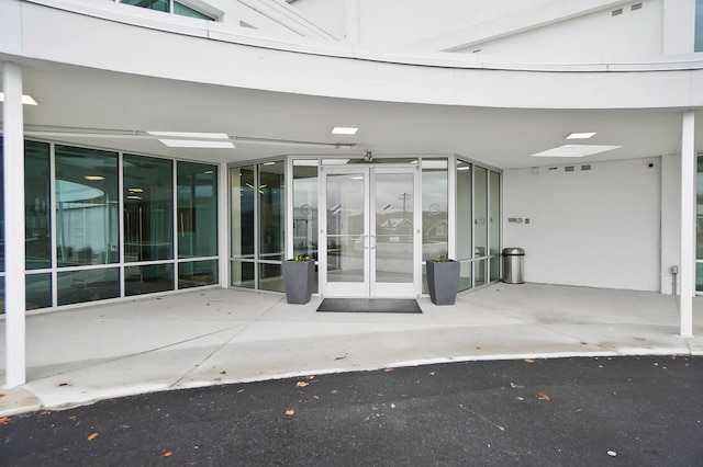 120 Main St Unit 306, Newport, KY 41071 - view of exterior entry featuring french doors and a patio area