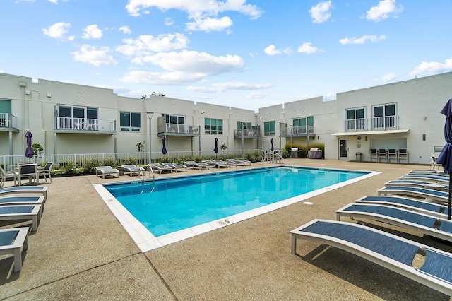 120 Main St Unit 306, Newport, KY 41071 - community pool with fence, a residential view, and a patio area