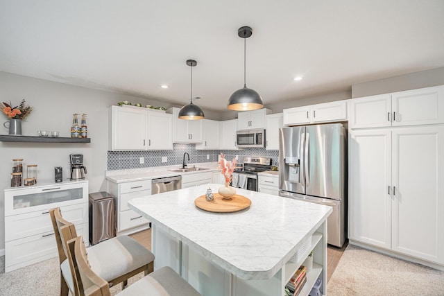 2263 Piazza Rdg, Covington, KY 41017 - kitchen featuring appliances with stainless steel finishes, open shelves, a sink, light countertops, and white cabinets