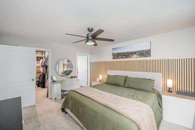 2263 Piazza Rdg, Covington, KY 41017 - carpeted bedroom with a spacious closet, a closet, a ceiling fan, and a textured ceiling