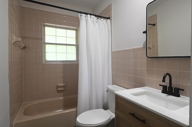 529 Stevenson Rd, Erlanger, KY 41018 - full bathroom featuring toilet, vanity, tile walls, shower / bath combo, and tasteful backsplash
