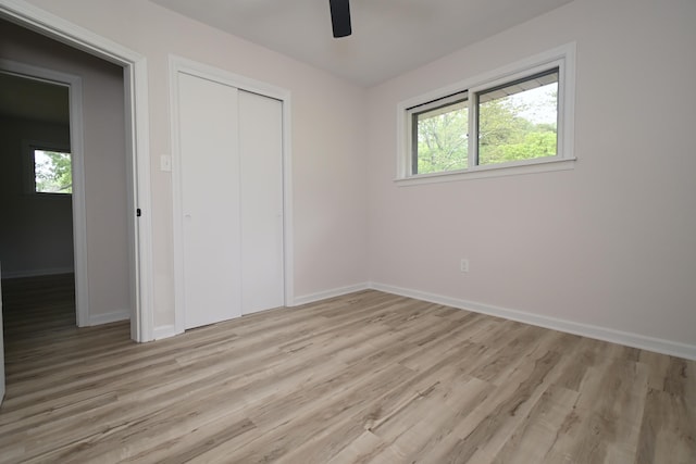 529 Stevenson Rd, Erlanger, KY 41018 - unfurnished bedroom featuring multiple windows, light wood-style flooring, and baseboards
