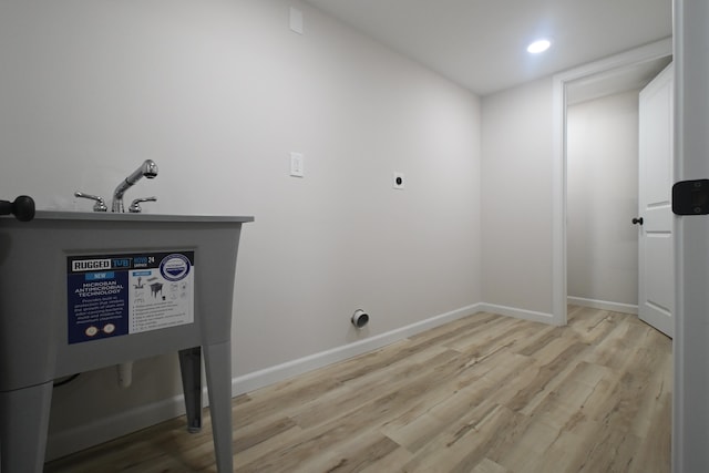 529 Stevenson Rd, Erlanger, KY 41018 - laundry area featuring wood finished floors, recessed lighting, baseboards, and electric dryer hookup