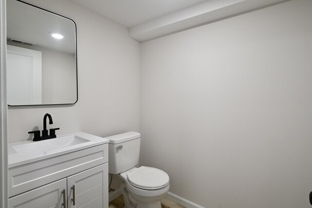 529 Stevenson Rd, Erlanger, KY 41018 - bathroom with vanity, toilet, and baseboards
