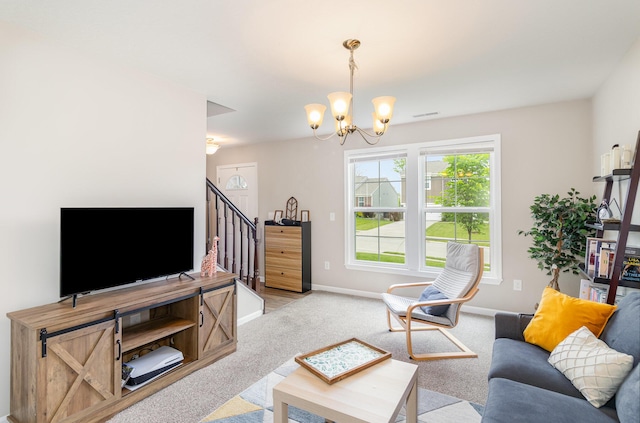 carpeted living area with a chandelier, baseboards, and stairway