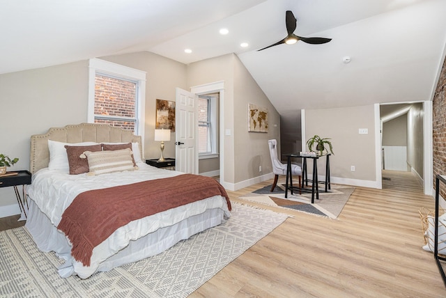 1102 Lee St, Covington, KY 41011 - bedroom with vaulted ceiling, light wood-style floors, baseboards, ceiling fan, and recessed lighting