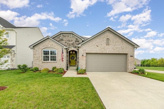 view of front of home featuring a garage, driveway, a front lawn, and brick siding