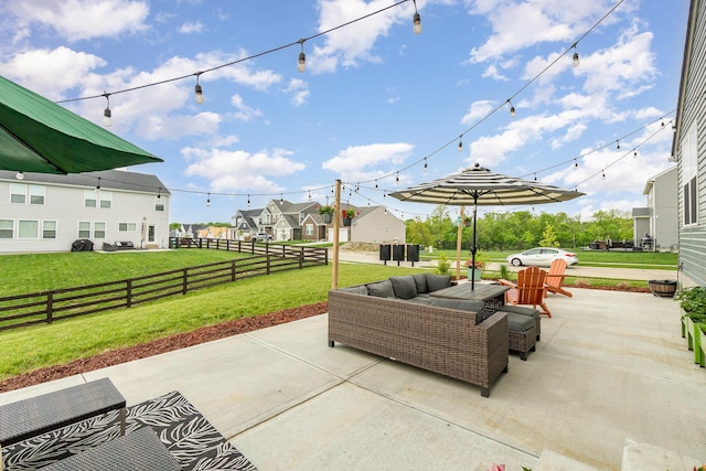view of patio / terrace featuring outdoor lounge area and a residential view