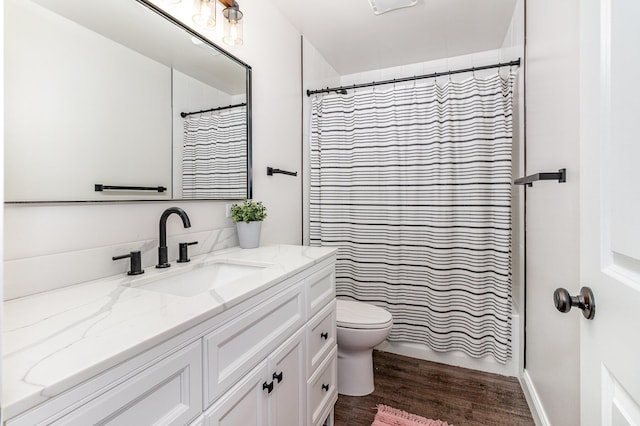 810 Saratoga St, Newport, KY 41071 - bathroom featuring toilet, wood finished floors, vanity, and curtained shower
