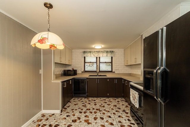 1101 Mckinney Ave, Dayton, KY 41074 - kitchen with black appliances, a sink, light countertops, decorative backsplash, and pendant lighting