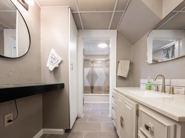 1101 Mckinney Ave, Dayton, KY 41074 - full bathroom with vanity, shower / bath combination with glass door, tile patterned floors, and baseboards