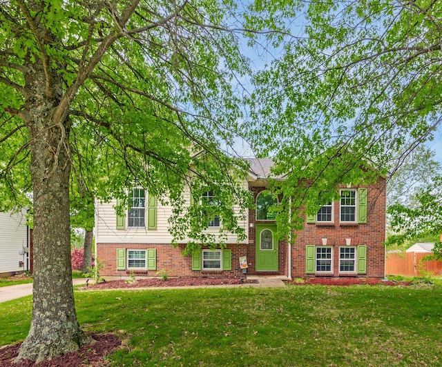 view of front of property featuring brick siding
