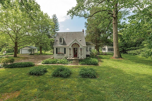 4026 N Lake Dr, Morning View, KY 41063 - new england style home with a front lawn, an outdoor structure, and a garage