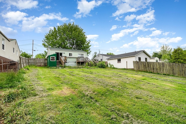 view of yard featuring a wooden deck