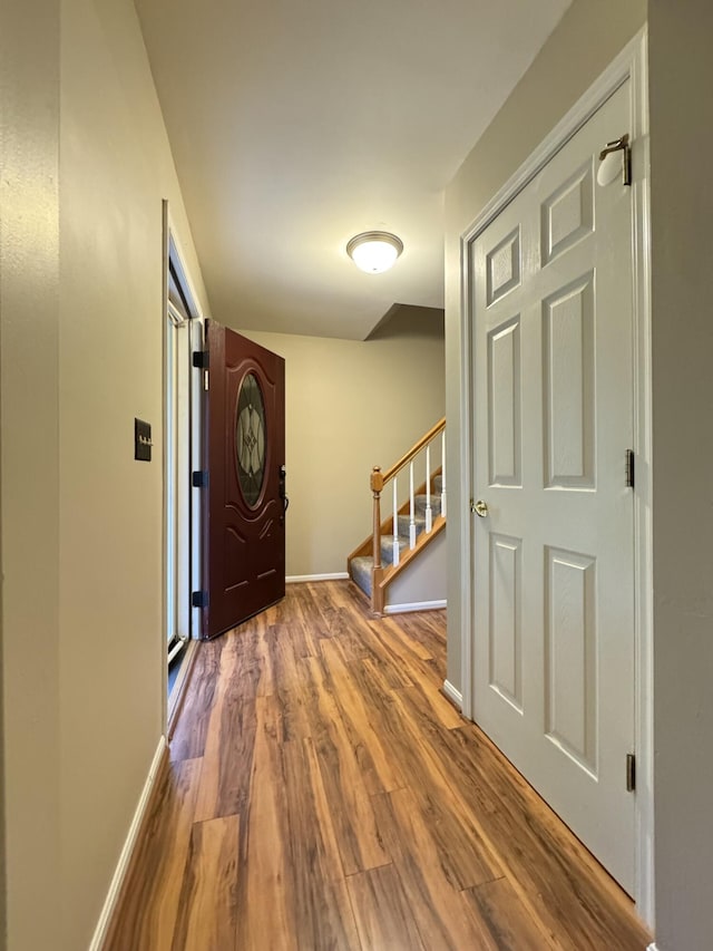1317 Brook Ct, Erlanger, KY 41018 - foyer entrance featuring stairs, wood finished floors, and baseboards