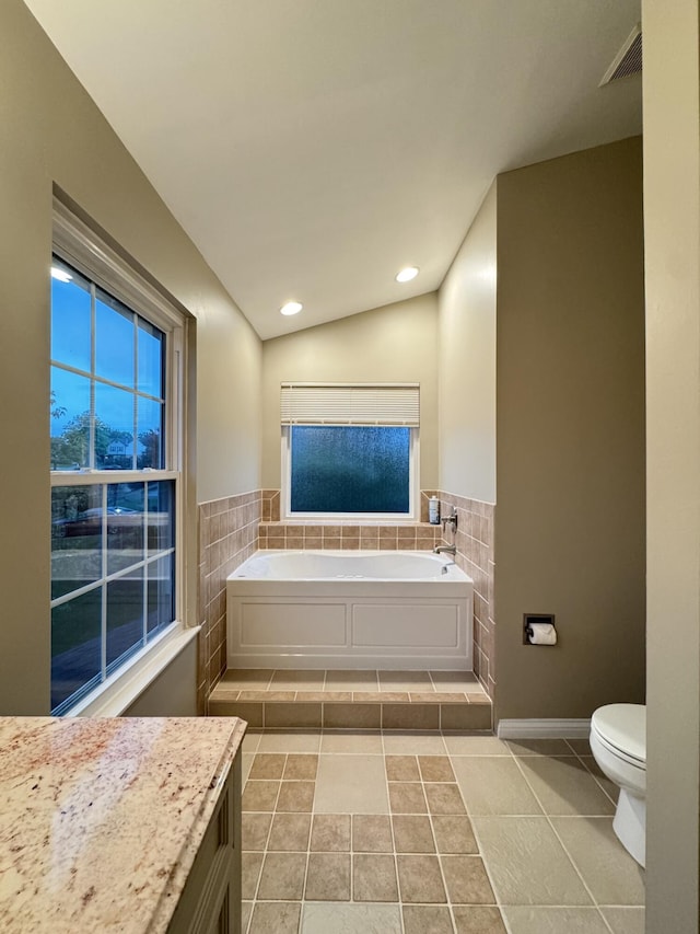1317 Brook Ct, Erlanger, KY 41018 - bathroom with tile patterned flooring, a bath, toilet, tile walls, and vanity