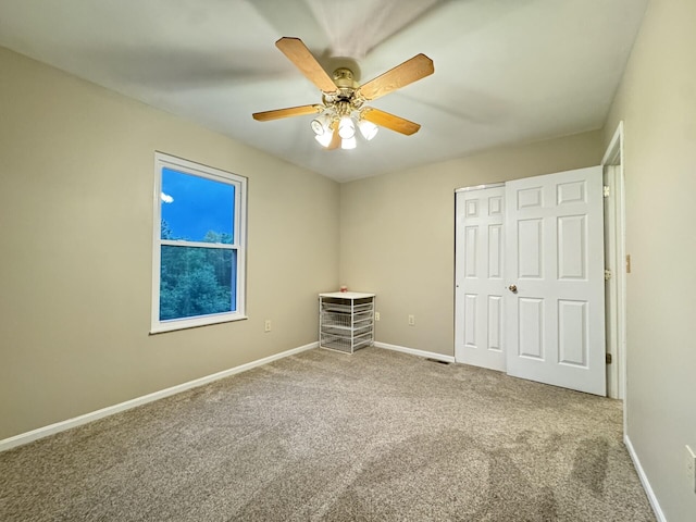 1317 Brook Ct, Erlanger, KY 41018 - unfurnished bedroom with carpet, a closet, baseboards, and a ceiling fan