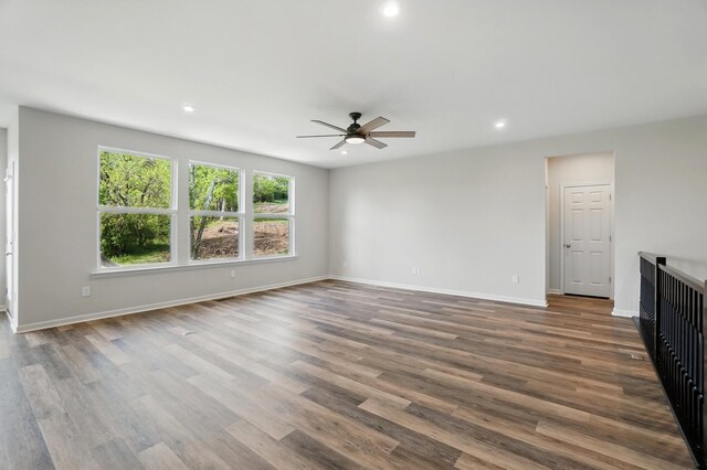 8042 Arcadia Blvd, Alexandria, KY 41001 - unfurnished living room featuring a ceiling fan, recessed lighting, wood finished floors, and baseboards