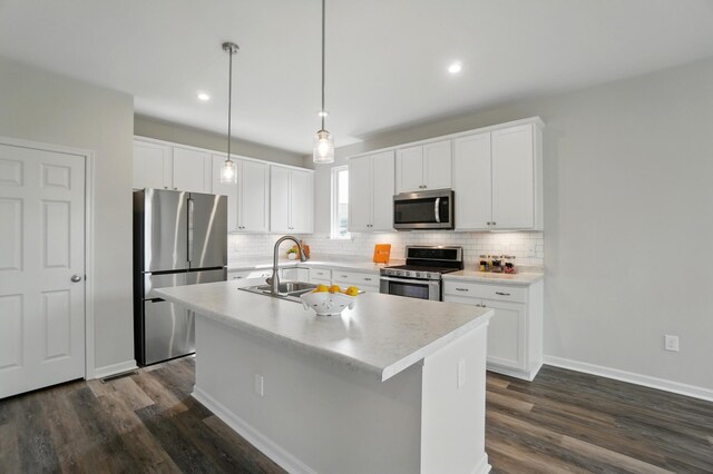 8042 Arcadia Blvd, Alexandria, KY 41001 - kitchen featuring stainless steel appliances, a sink, decorative backsplash, dark wood-style flooring, and recessed lighting