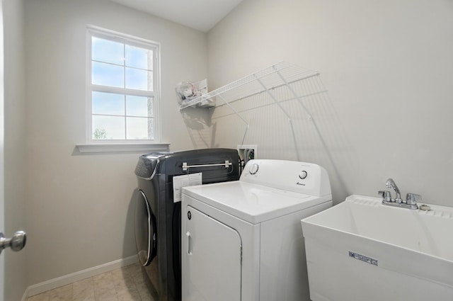 8042 Arcadia Blvd, Alexandria, KY 41001 - laundry room with washer and clothes dryer and baseboards