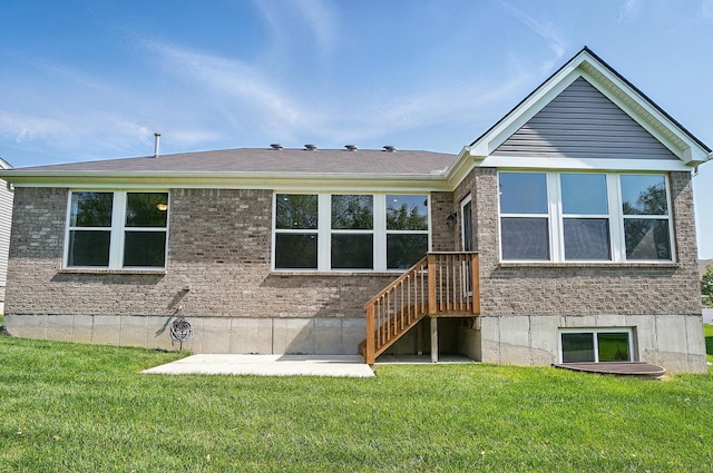 8042 Arcadia Blvd, Alexandria, KY 41001 - back of house featuring a lawn, brick siding, and a patio