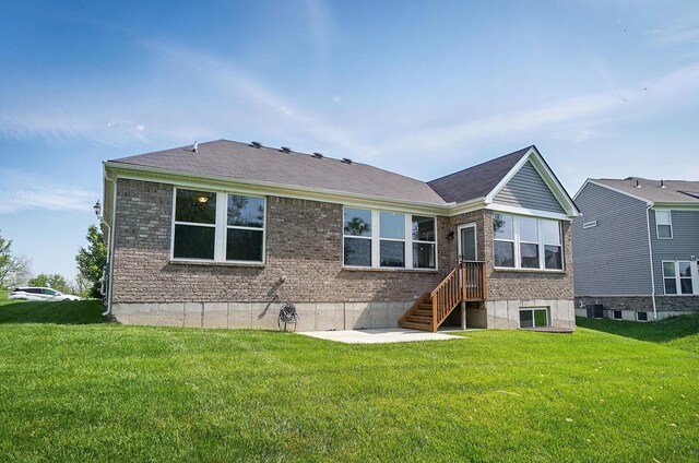 8042 Arcadia Blvd, Alexandria, KY 41001 - back of house featuring a lawn, a patio area, and brick siding