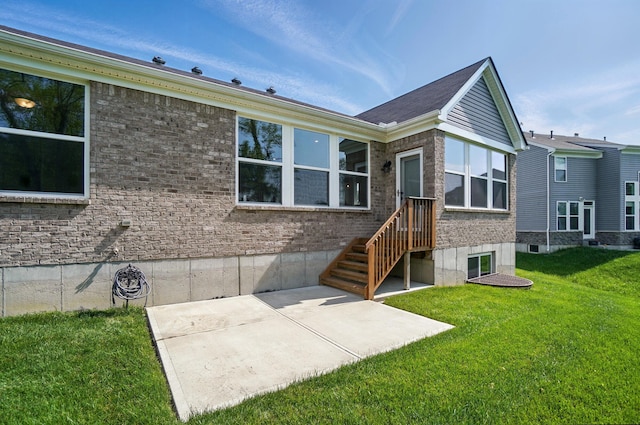 8042 Arcadia Blvd, Alexandria, KY 41001 - back of property featuring a yard, a patio, and brick siding