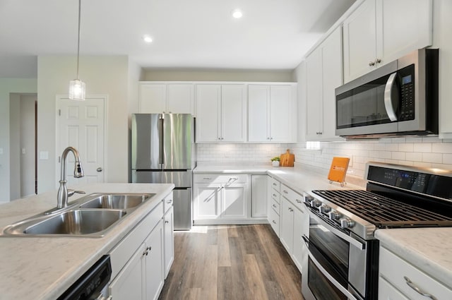 8042 Arcadia Blvd, Alexandria, KY 41001 - kitchen featuring appliances with stainless steel finishes, a sink, dark wood-type flooring, white cabinets, and recessed lighting