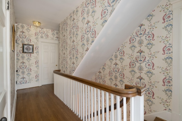 69 Linden Ave, Fort Thomas, KY 41075 - hallway with wallpapered walls, wood finished floors, baseboards, and an upstairs landing