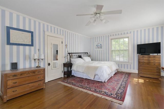 69 Linden Ave, Fort Thomas, KY 41075 - bedroom with wood finished floors, wallpapered walls, ornamental molding, a ceiling fan, and baseboards