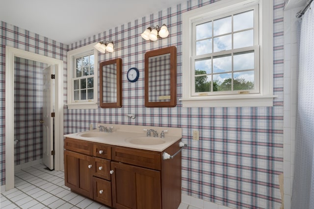 69 Linden Ave, Fort Thomas, KY 41075 - bathroom with wallpapered walls, healthy amount of natural light, tile patterned flooring, and double vanity