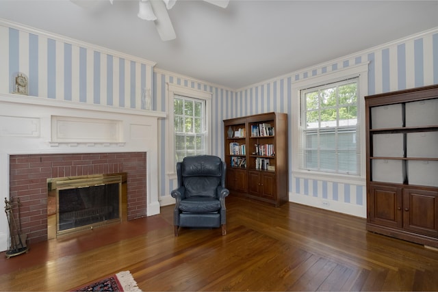 69 Linden Ave, Fort Thomas, KY 41075 - living room featuring wallpapered walls, a fireplace, ceiling fan, wood finished floors, and baseboards