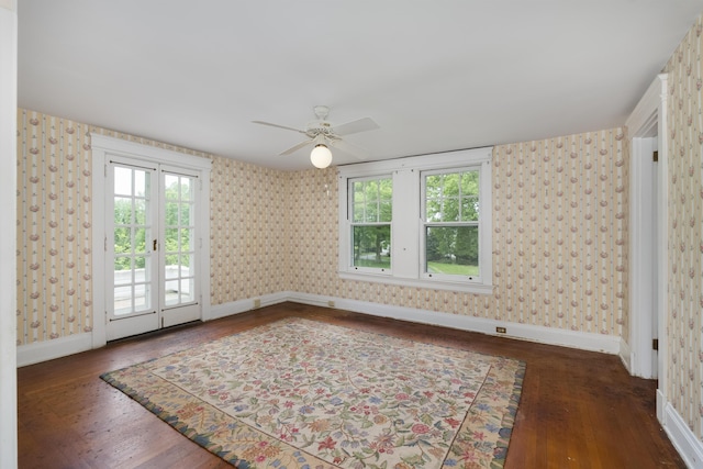 32 S Shaw Ln, Fort Thomas, KY 41075 - empty room with wallpapered walls, baseboards, plenty of natural light, and wood finished floors