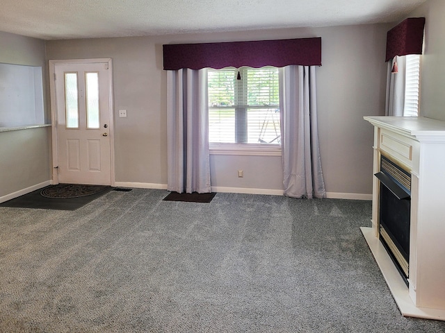 107 Timberlake Ave, Erlanger, KY 41018 - carpeted entrance foyer with a fireplace and baseboards